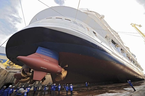 Royal Caribbeans Oasis of the Seas, at 220,000 tons the worlds biggest cruise ship by a long shot, will debut in 2009. Shell span 16 decks, carry 5,400 passengers and feature a new neighborhood concept complete with seven distinct-themed areas.