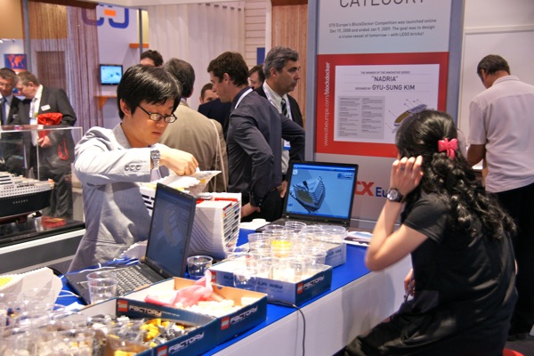 dsc06270 Also at the STX Europe booth was this guy building a Lego model of a ship. He was following step-by-step directions from a computer.
