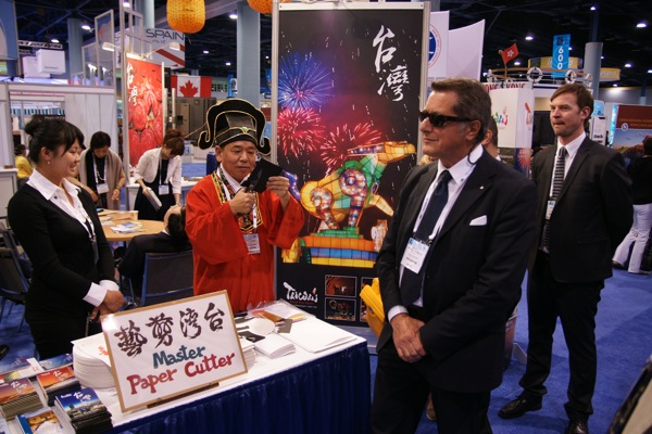 dsc06293 This gentleman at the Taiwan booth would very quickly cut your profile into a piece of paper. It was very detailed and he only used scissors to do it.